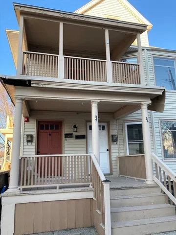 a view of a house with deck and deck