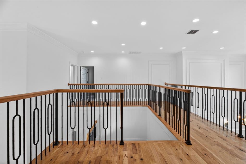 7798 Barber Rnch Road Fort Worth, TX 76126 - Photo 27 of 40 a view of staircase with wooden floor