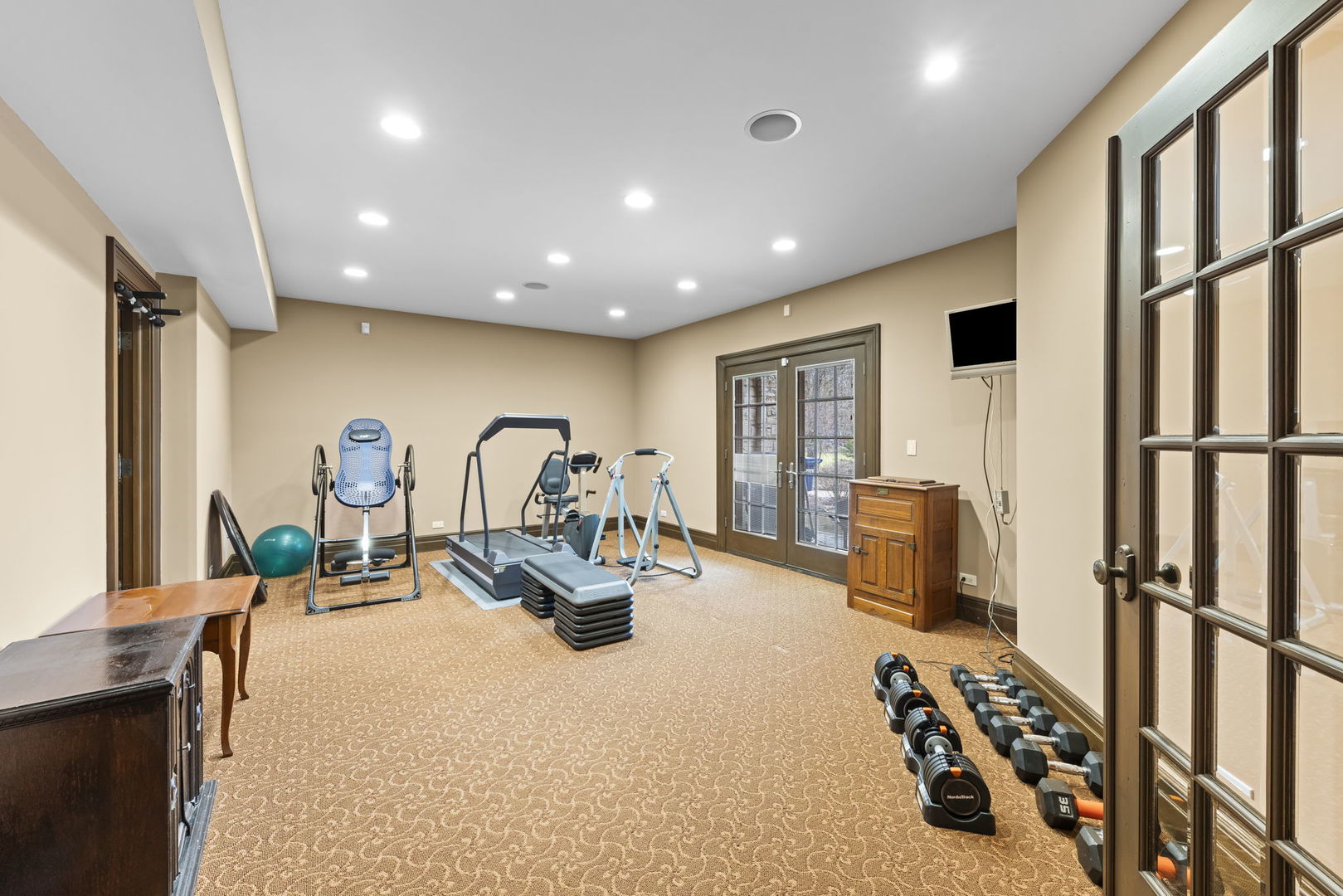 24W141 Hobson Road Naperville, IL 60540 - Photo 45 of 70 a view of a room with gym equipment