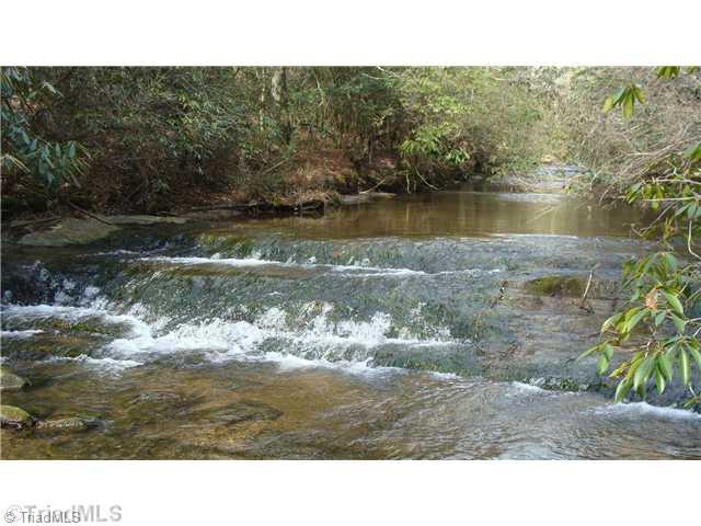 360 Lewis Elkin, NC 28621 - Photo 1 of 11 Land. Your own private waterfall on spectacular creek