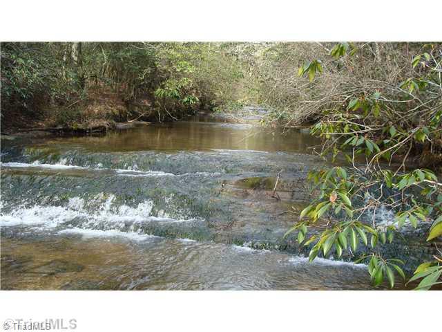 360 Lewis Elkin, NC 28621 - Photo 8 of 11 Land. Your own private waterfall
