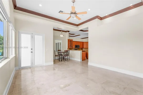 a view of a livingroom with a furniture and a chandelier