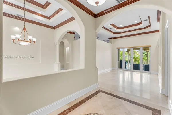 a view of a living room with a large window