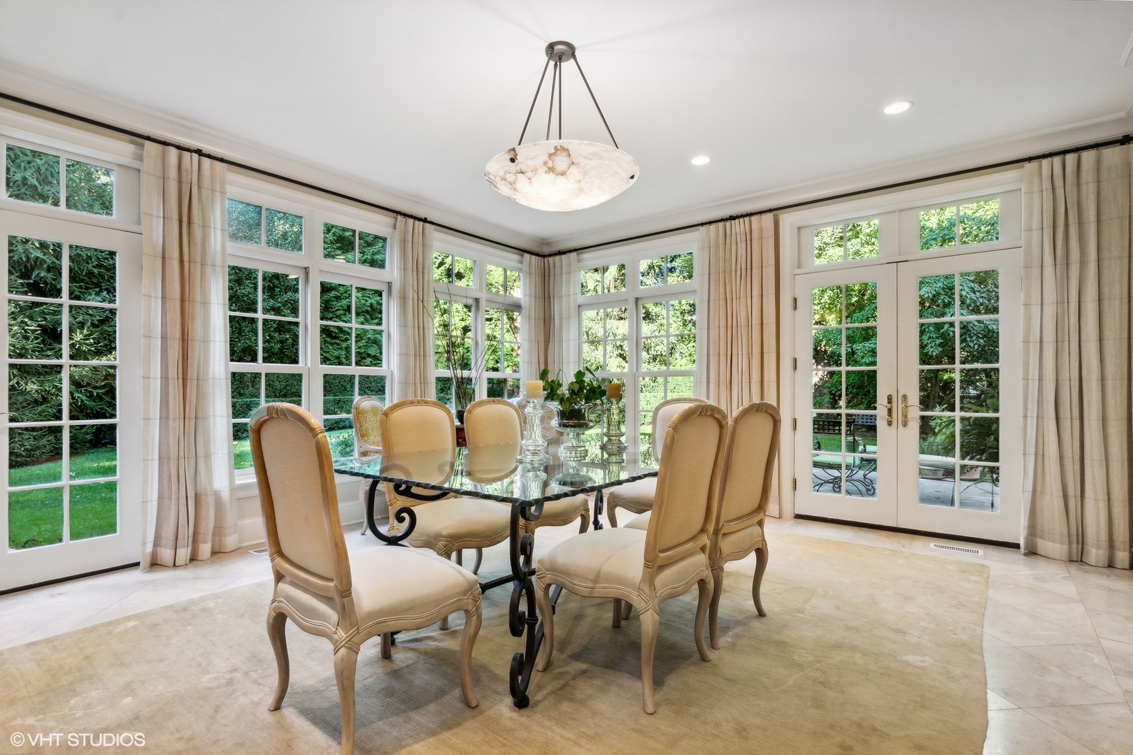 796 East Deerpath Road Lake Forest, IL 60045 - Photo 22 of 60 a dining room with furniture and a large window