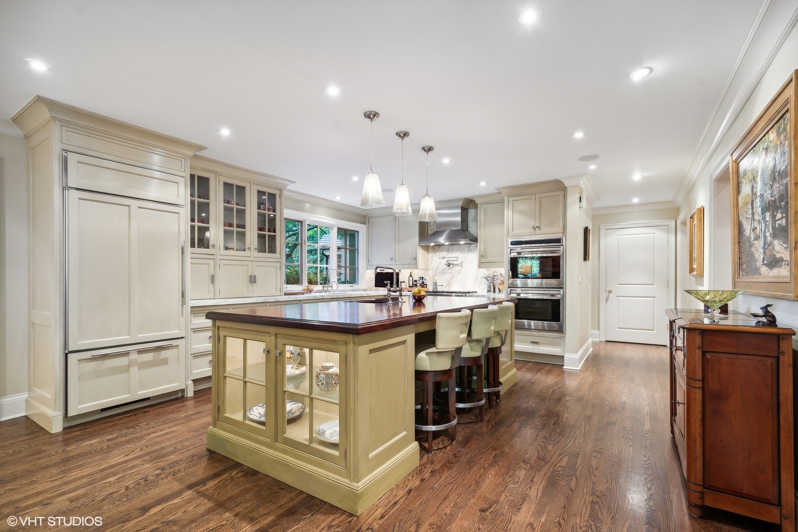 796 East Deerpath Road Lake Forest, IL 60045 - Photo 24 of 60 a kitchen with stainless steel appliances granite countertop a refrigerator and a stove top oven
