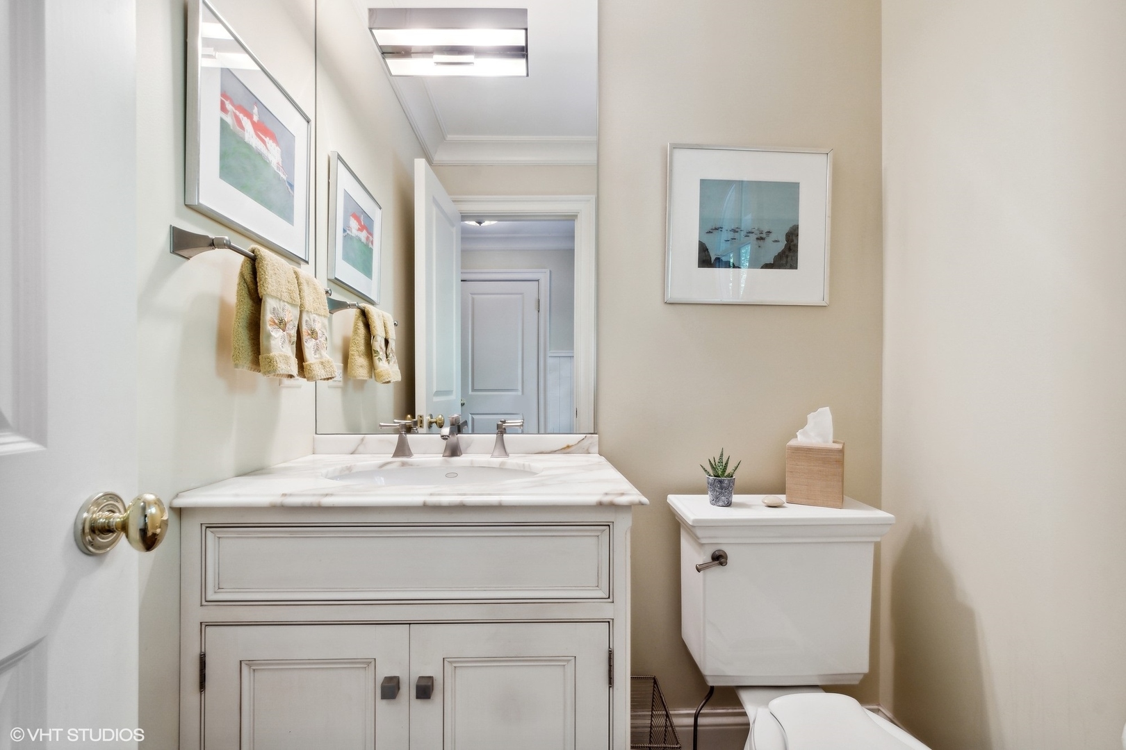 796 East Deerpath Road Lake Forest, IL 60045 - Photo 31 of 60 a bathroom with a sink toilet and mirror