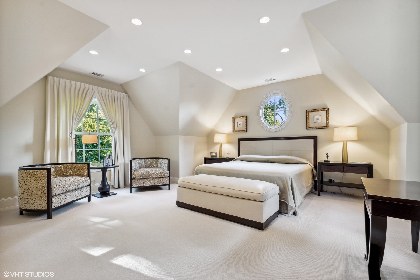 796 East Deerpath Road Lake Forest, IL 60045 - Photo 38 of 60 a spacious bedroom with a bed and a couch