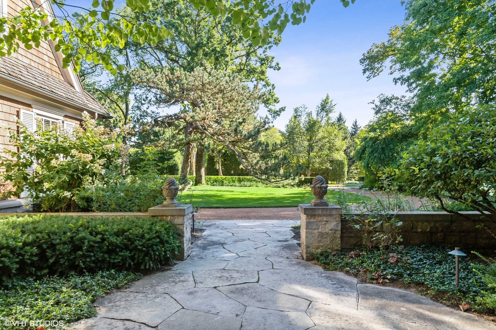796 East Deerpath Road Lake Forest, IL 60045 - Photo 4 of 60 a view of a garden with large trees
