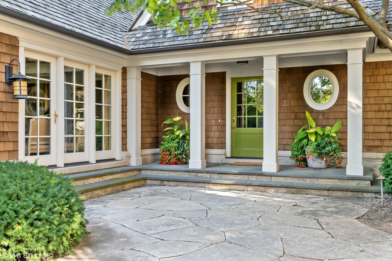 796 East Deerpath Road Lake Forest, IL 60045 - Photo 5 of 60 a front view of a building with a window and a garden