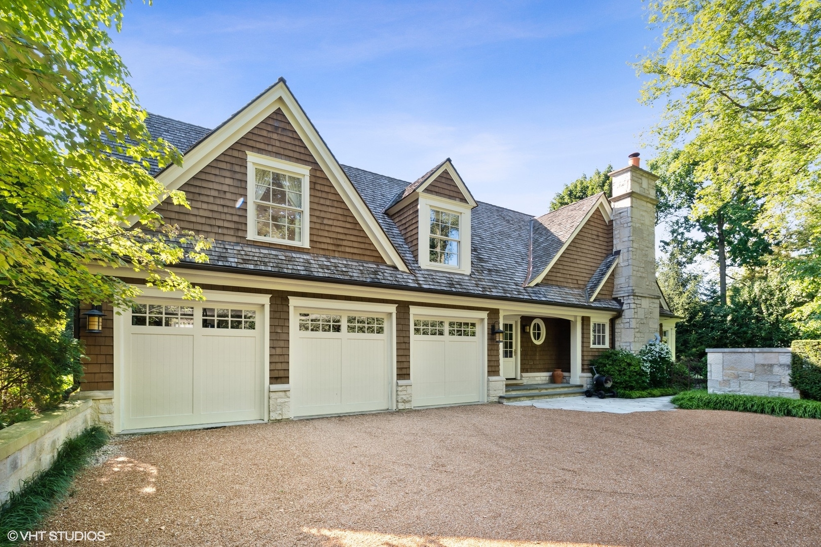 796 East Deerpath Road Lake Forest, IL 60045 - Photo 53 of 60 a front view of a house with a garden
