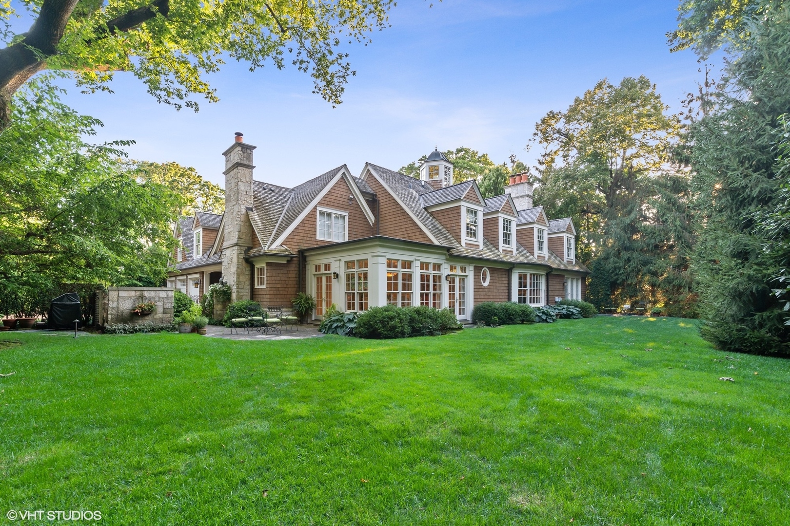 796 East Deerpath Road Lake Forest, IL 60045 - Photo 55 of 60 a view of a house with a big yard and large trees