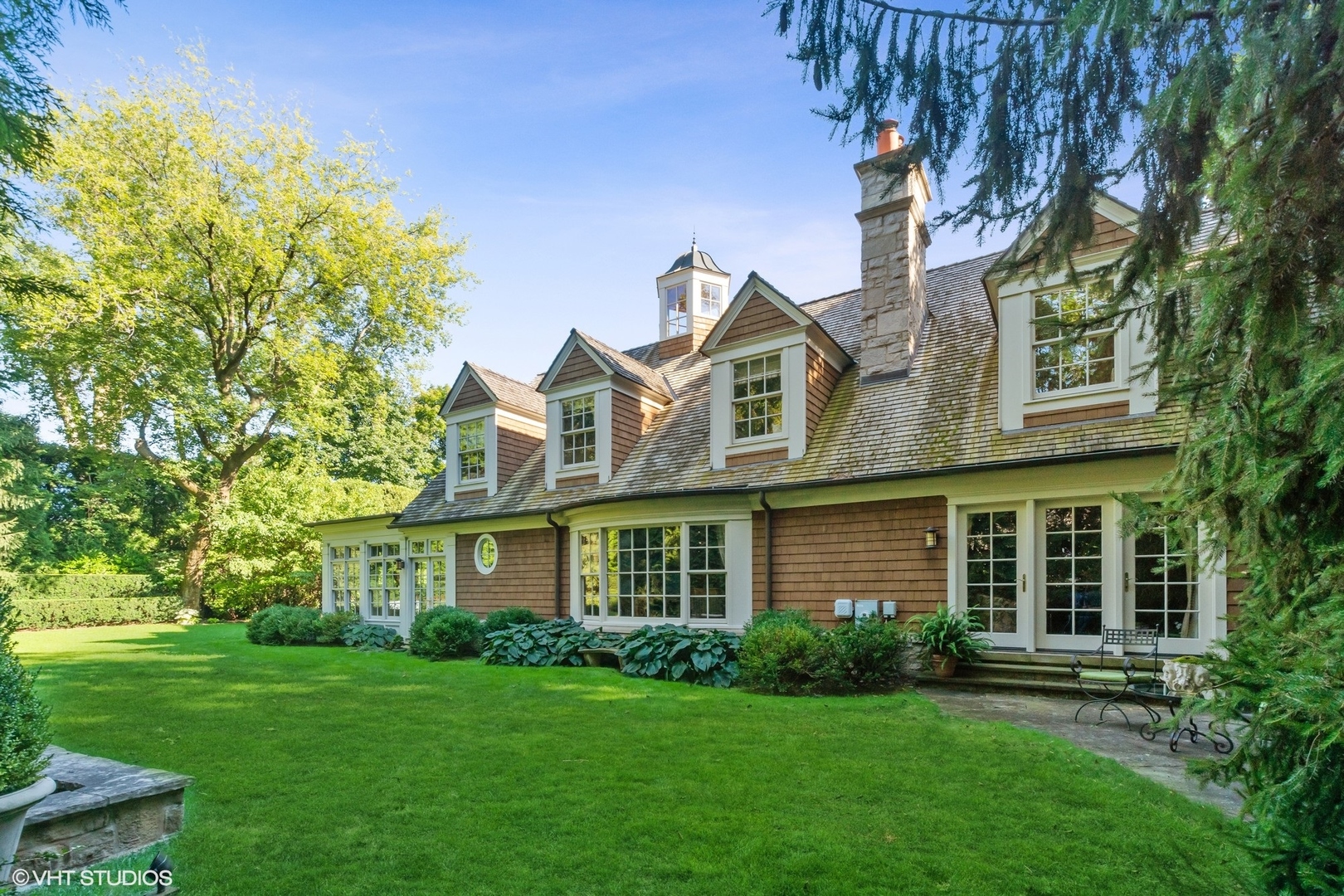 796 East Deerpath Road Lake Forest, IL 60045 - Photo 56 of 60 front view of a house with a garden