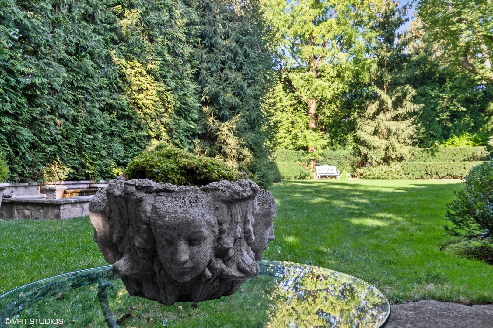 796 East Deerpath Road Lake Forest, IL 60045 - Photo 58 of 60 a view of a backyard with wooden fence