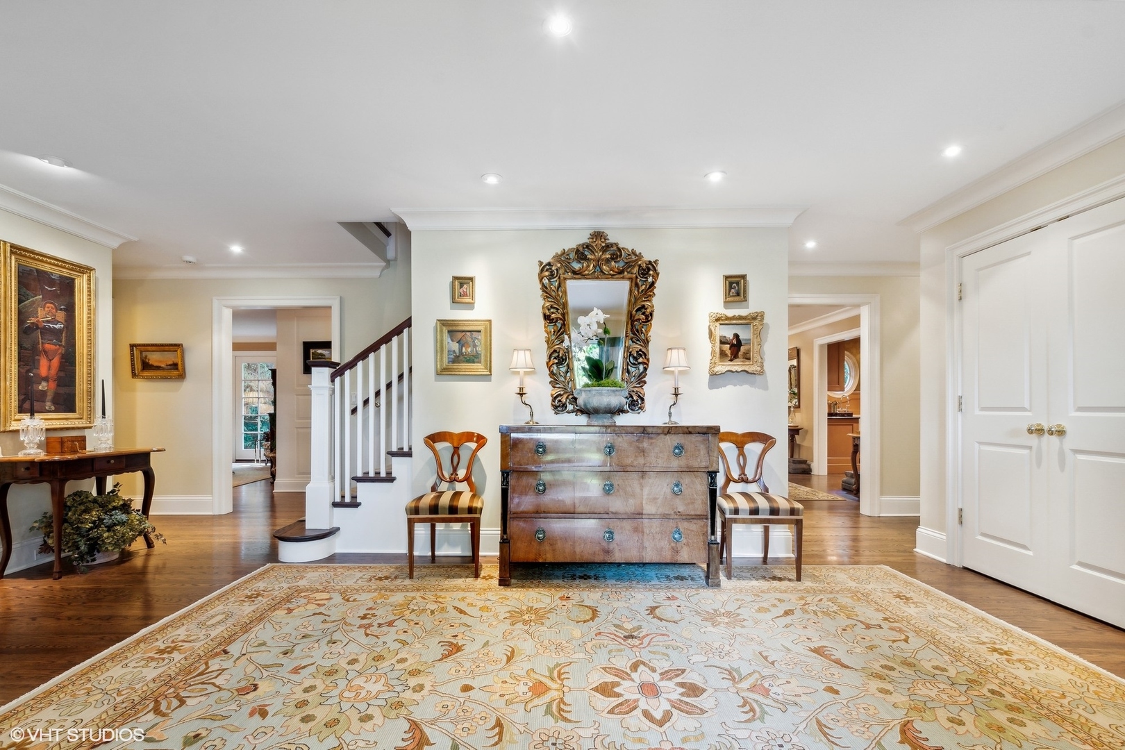 796 East Deerpath Road Lake Forest, IL 60045 - Photo 9 of 60 a living room with furniture and a dining table with rug floor