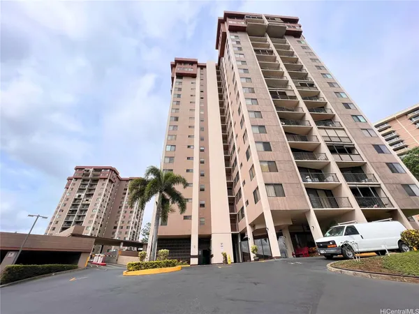a front view of a building with glass windows