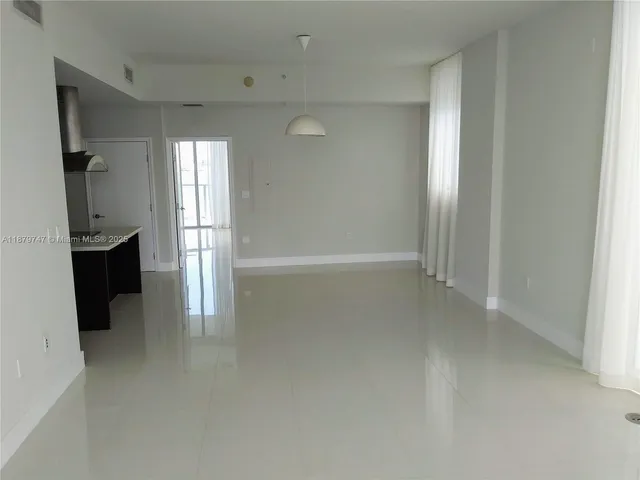 a view of a closet area with empty racks