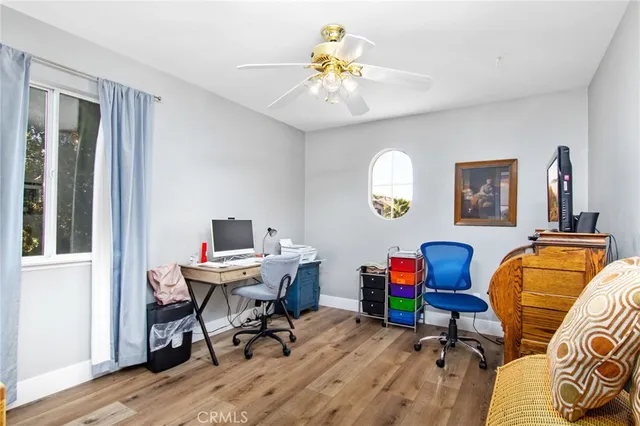 a workspace with wooden floor and a workspace