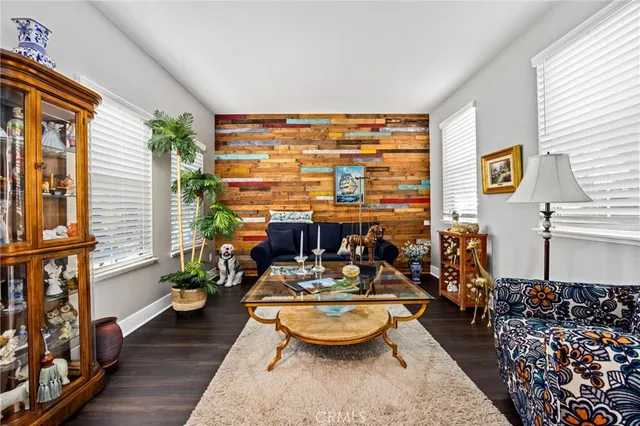 a room with furniture and a large window