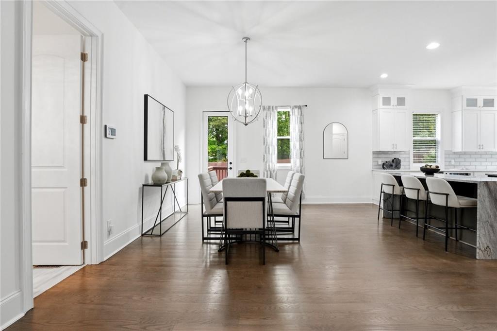 2415 West Rugby Avenue Atlanta, GA 30337 - Photo 6 of 40 a view of a livingroom with furniture window and wooden floor