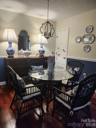 a table and chairs in the kitchen