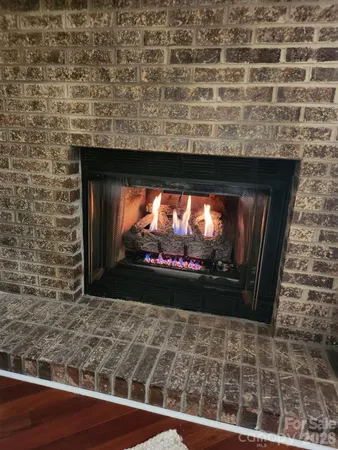 a living room with a fireplace