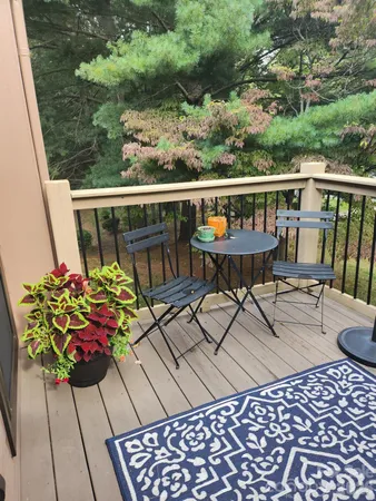 a view of a chairs and table in the terrace