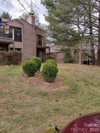 a view of house with outdoor space