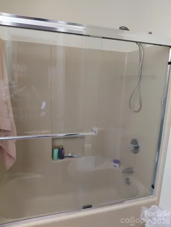 a room with furniture and wooden floor