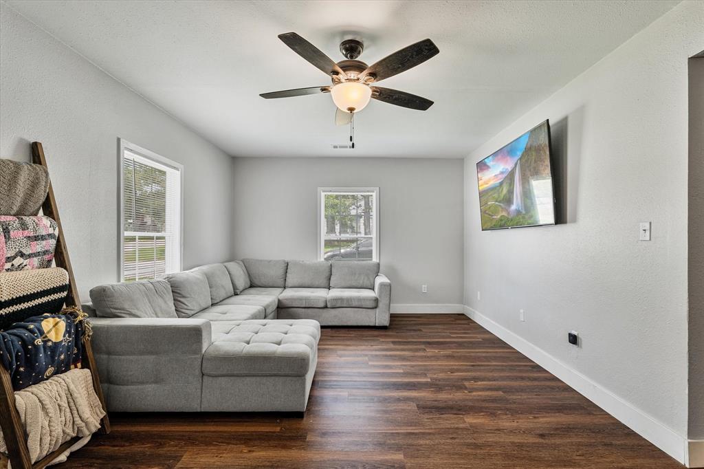 25 West Parnell Street Denison, TX 75020 - Photo 5 of 16 a living room with furniture and window