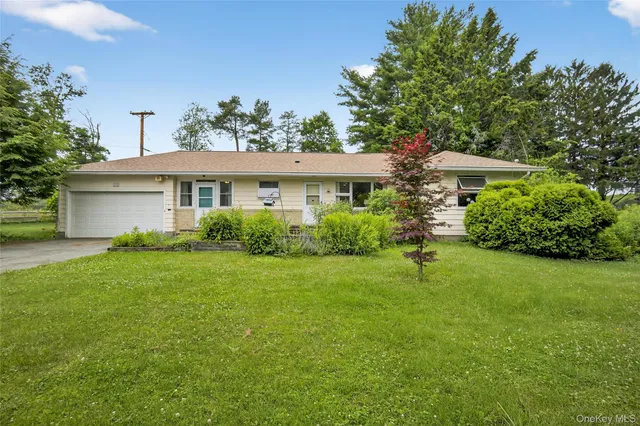 a house view with a garden space