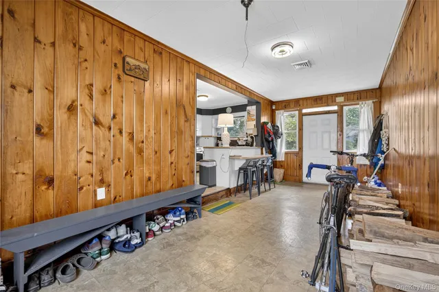 a room with lots of gym equipment