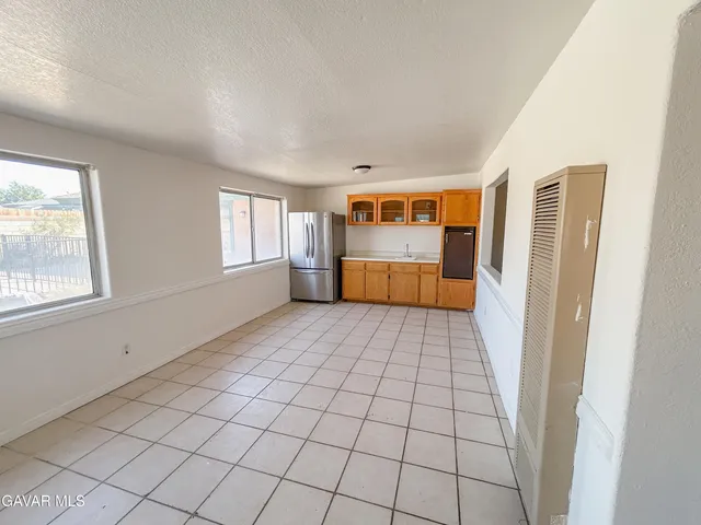 a view of empty room with windows