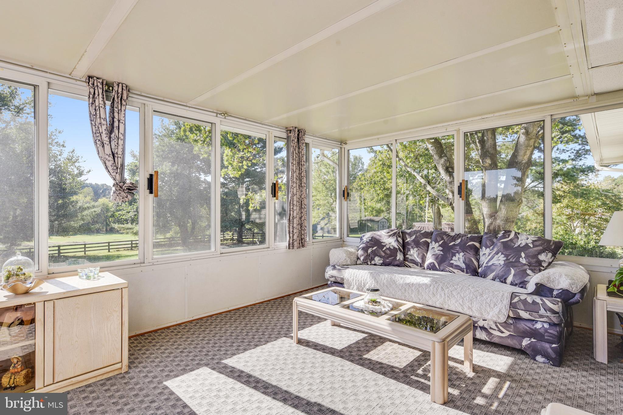 9583 Routts Hill Road Warrenton, VA 20186 - Photo 12 of 36 Large Sun Room with View to Back Yard