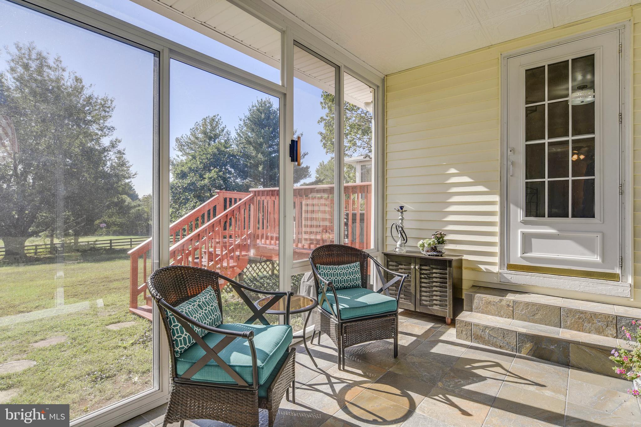 9583 Routts Hill Road Warrenton, VA 20186 - Photo 24 of 36 Enclosed walkway to the Garage