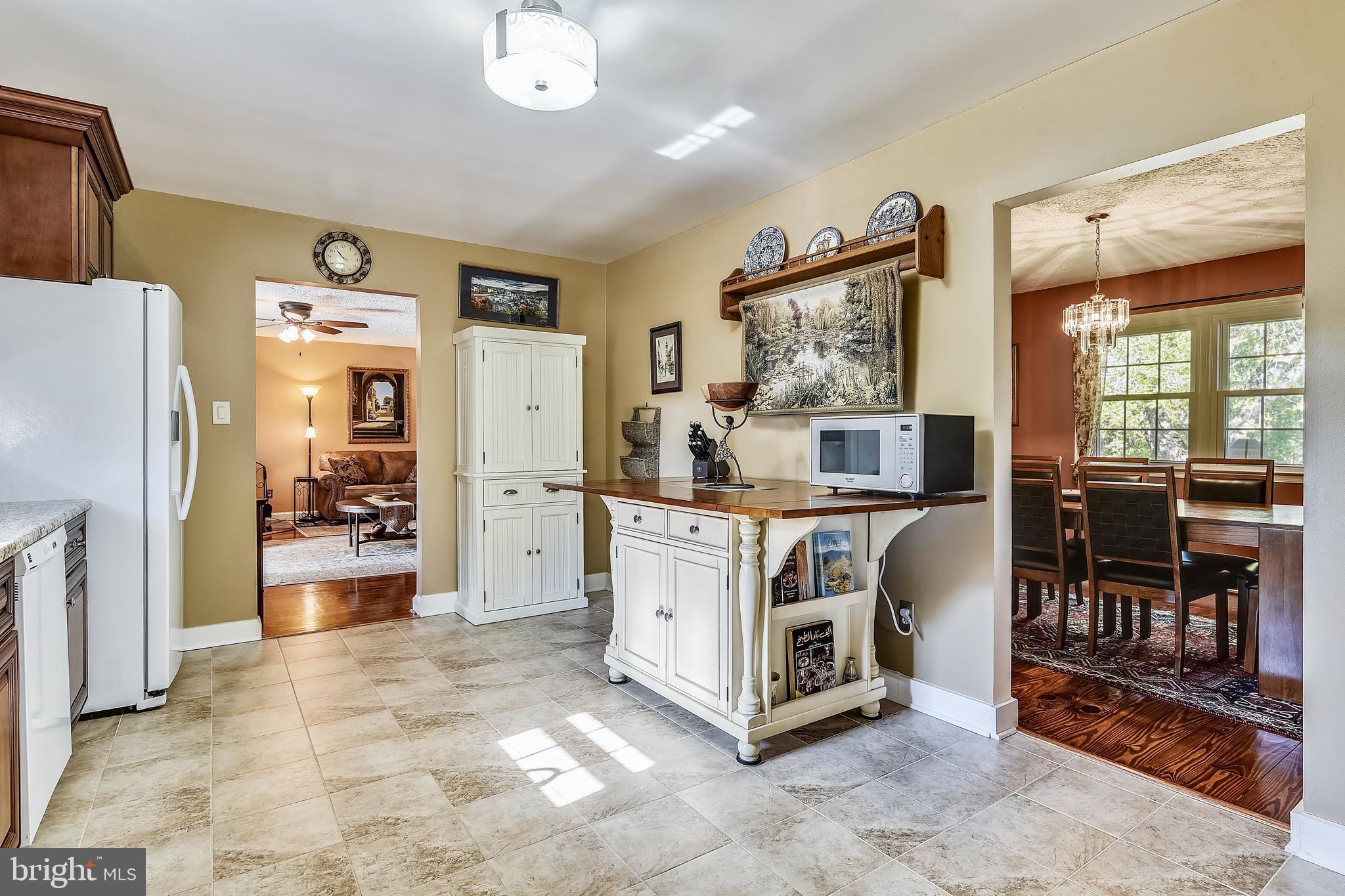 9583 Routts Hill Road Warrenton, VA 20186 - Photo 6 of 36 Kitchen View into Living Room and Dining Room