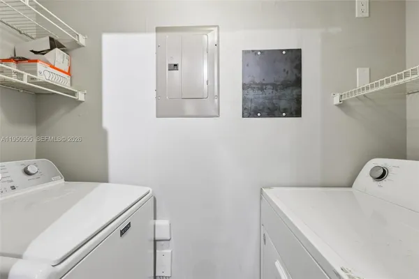 a view of a kitchen with a sink
