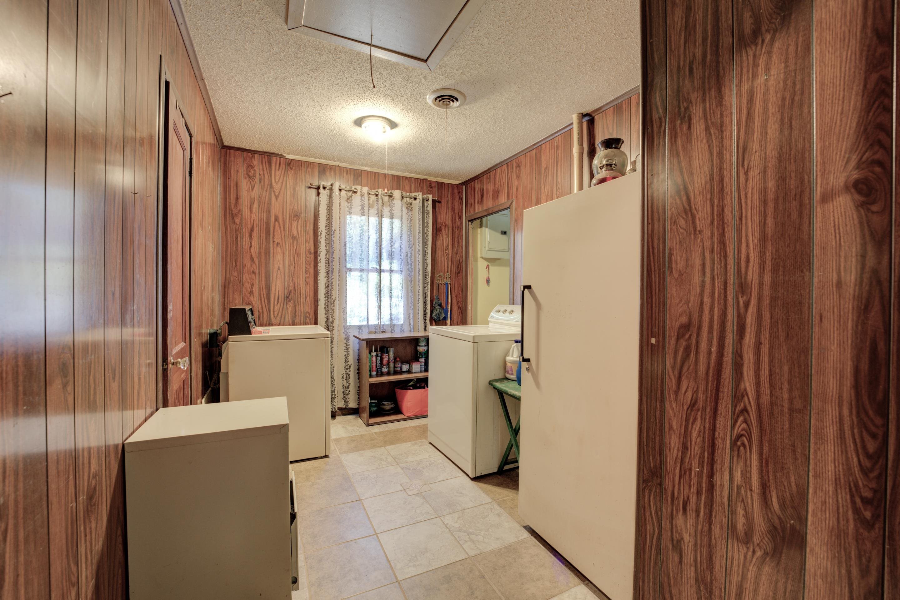 3649 Millington Road Memphis, TN 38127 - Photo 14 of 17 Doing laundry will be a breeze in this large laundry room with space for a freezer.