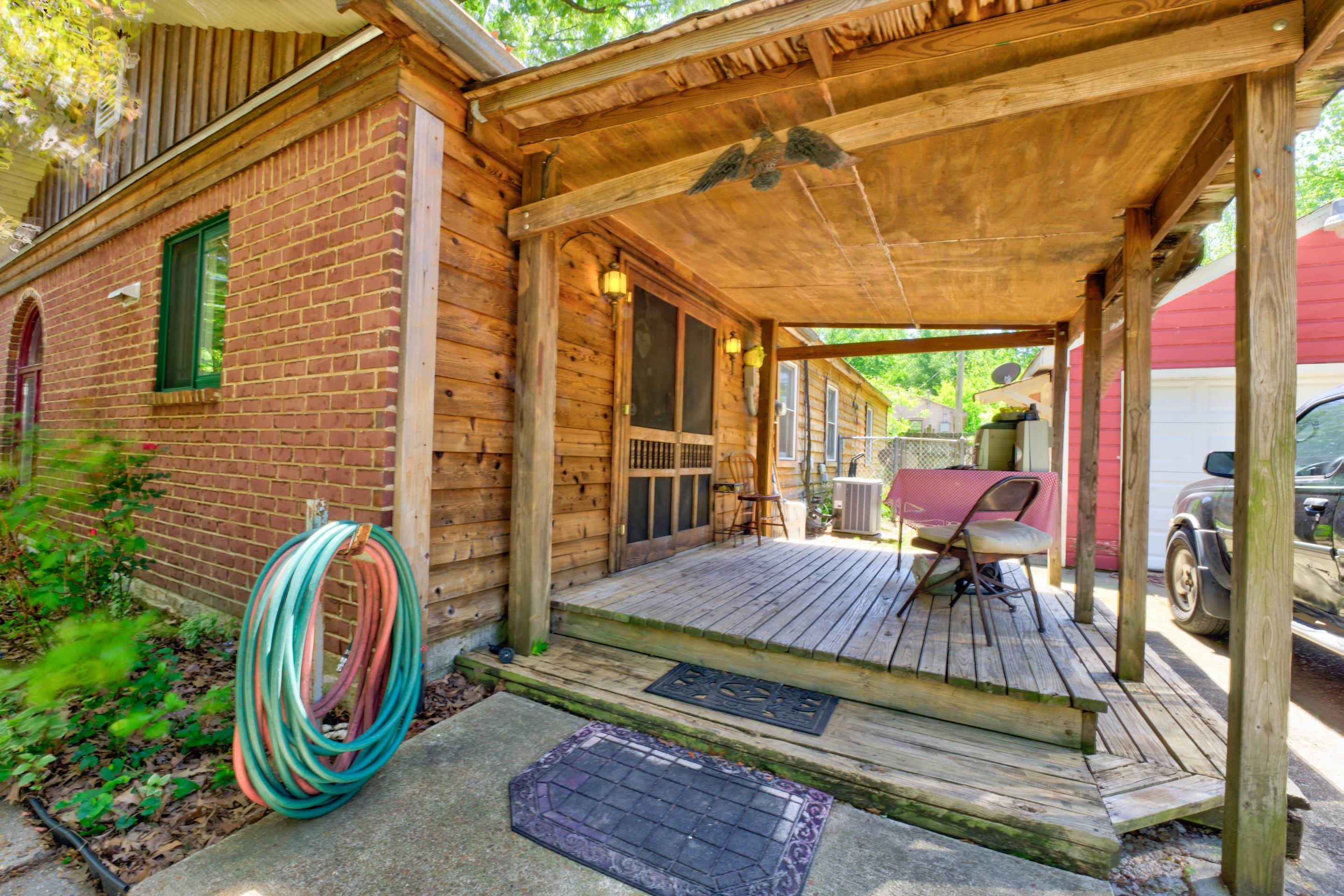 3649 Millington Road Memphis, TN 38127 - Photo 2 of 17 Enjoy a nice glass of sweet tea on the relaxing porch.