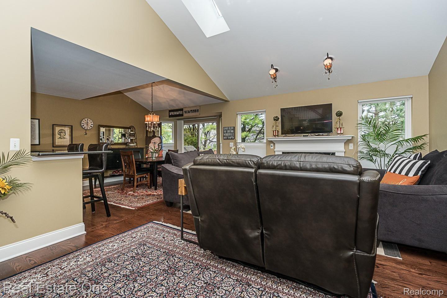 1083 Churchill Circle, Unit 77 Rochester, MI 48307 - Photo 35 of 61 1083 Churchill-Great room open to eating area