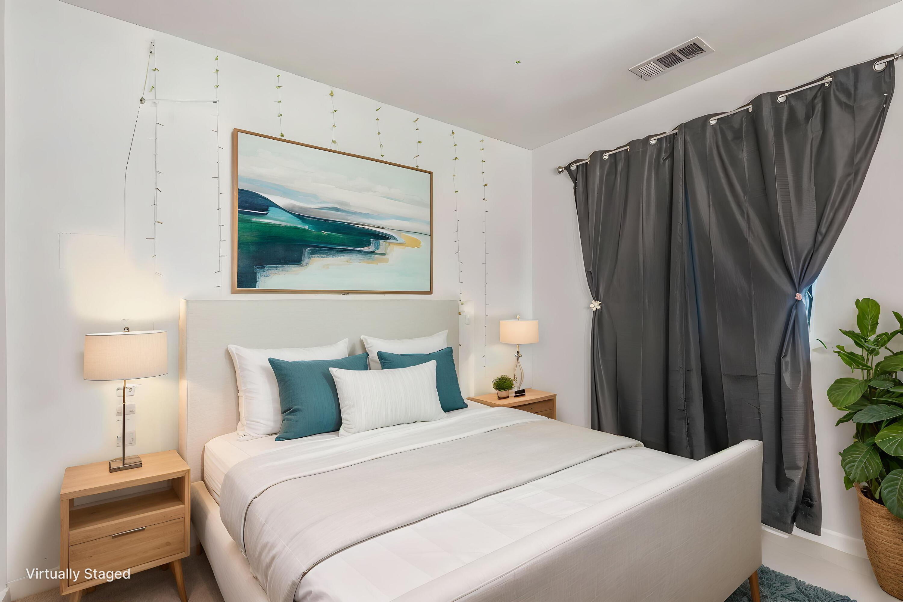 13702 Inaja Street Desert Hot Springs, CA 92240 - Photo 13 of 19 a bedroom with bed and a potted plant