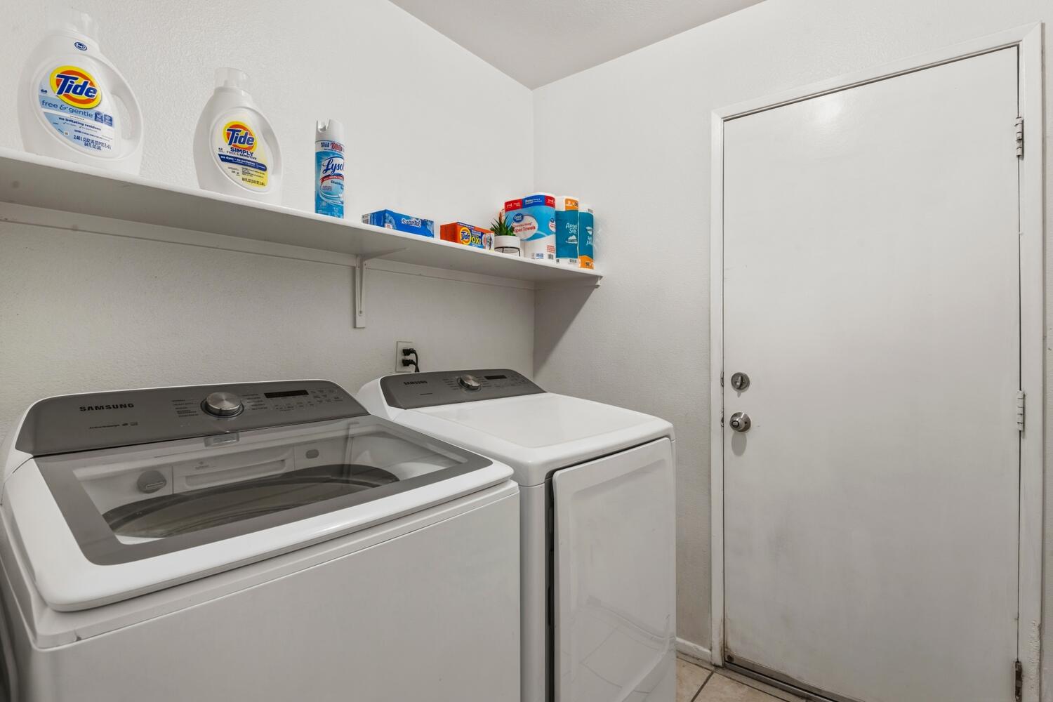 13702 Inaja Street Desert Hot Springs, CA 92240 - Photo 16 of 19 a utility room with dryer and washer