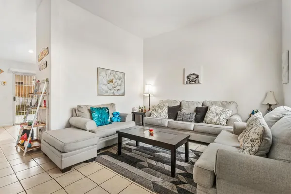 a living room with furniture and a couch