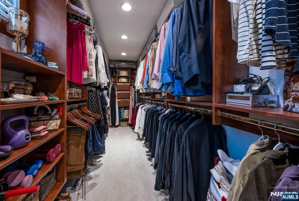84 Bogerts Mill Road Harrington Park, NJ 07640 - Photo 26 of 47 a view of walk in closet with clothes and shoes