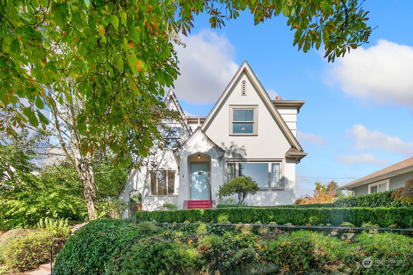 a front view of a house with a yard