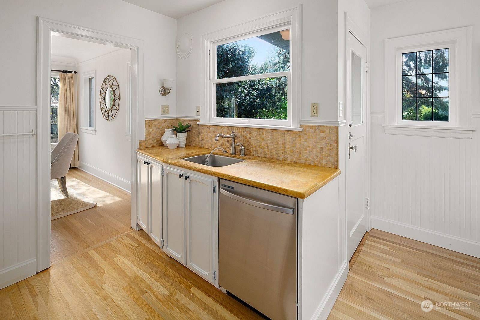 1908 Northeast Naomi Place Seattle, WA 98115 - Photo 11 of 30 a view of a kitchen from a hallway