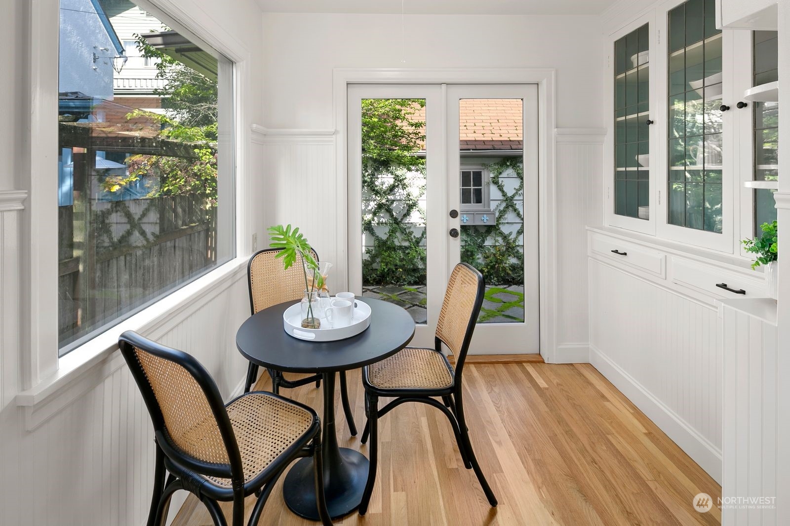 1908 Northeast Naomi Place Seattle, WA 98115 - Photo 13 of 30 a view of a dining room with furniture and wooden floor