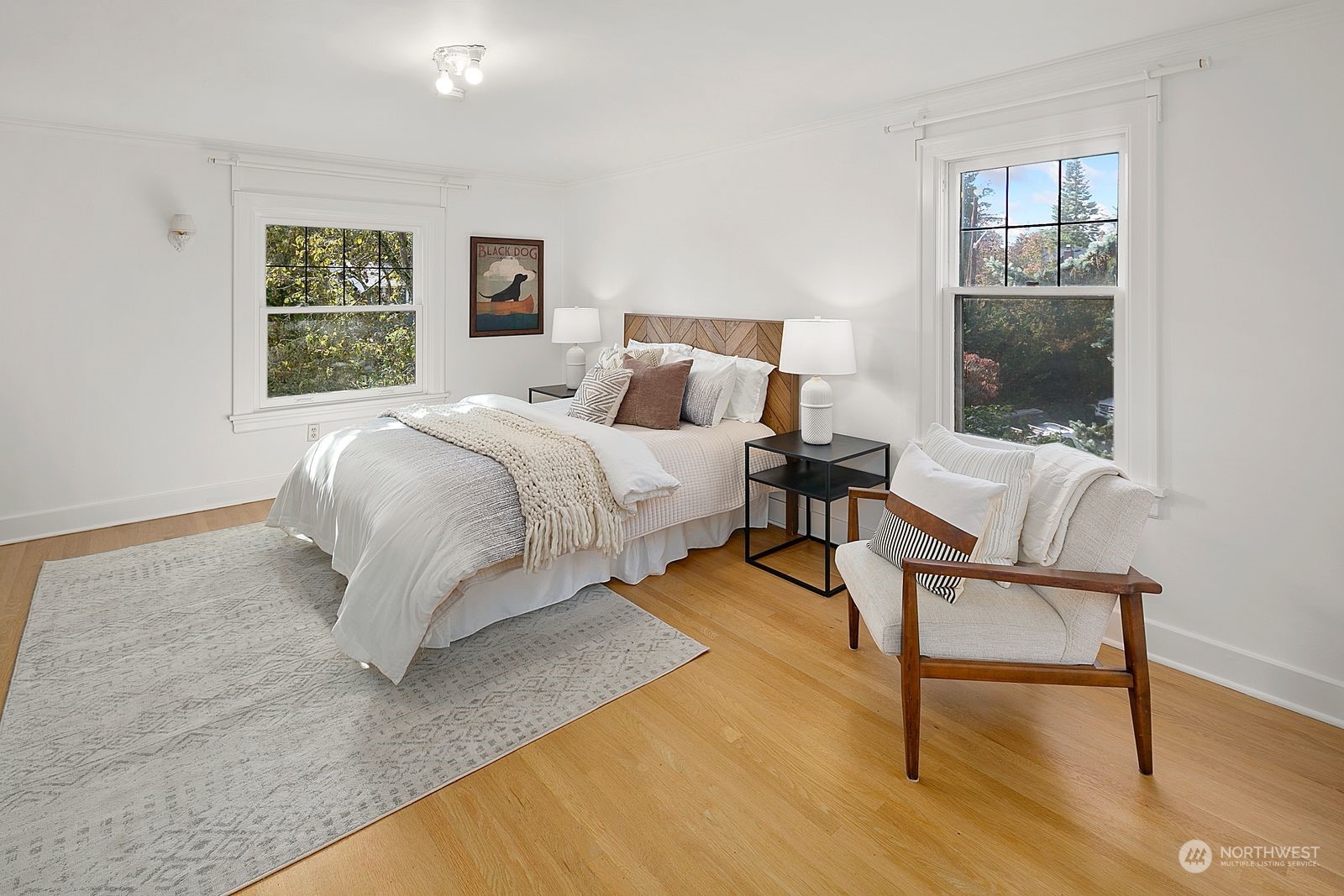 1908 Northeast Naomi Place Seattle, WA 98115 - Photo 17 of 30 a bed room with a bed and a chair