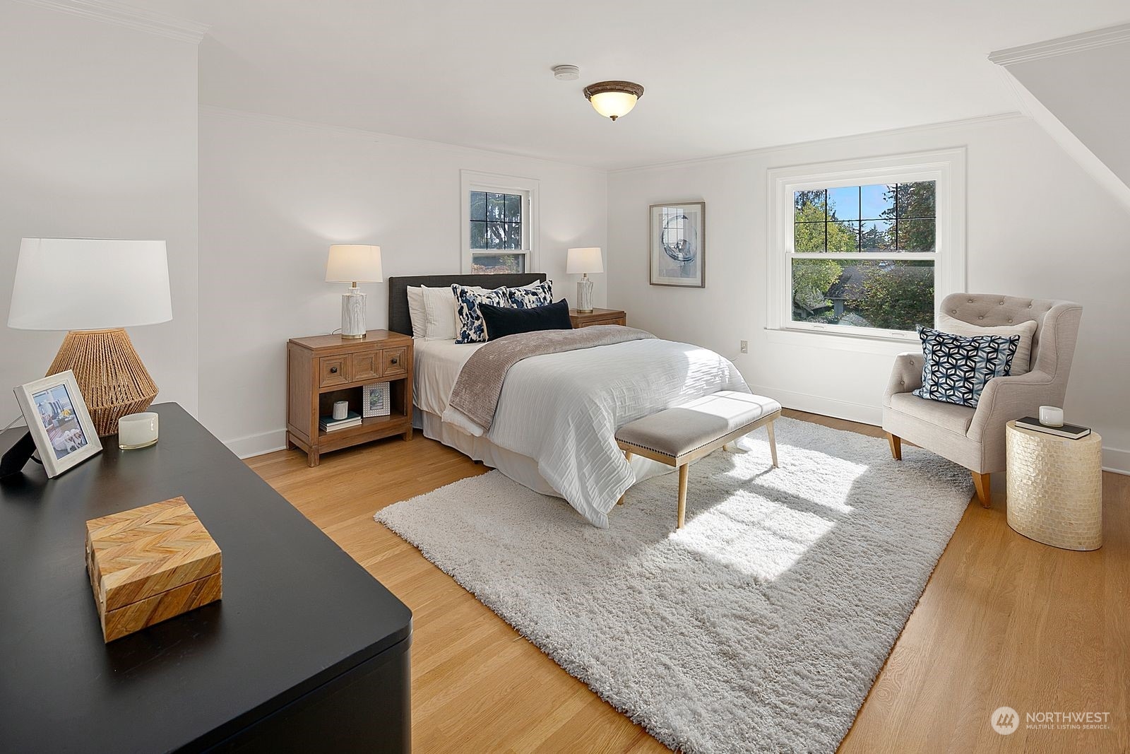 1908 Northeast Naomi Place Seattle, WA 98115 - Photo 18 of 30 a bedroom with a bed and window