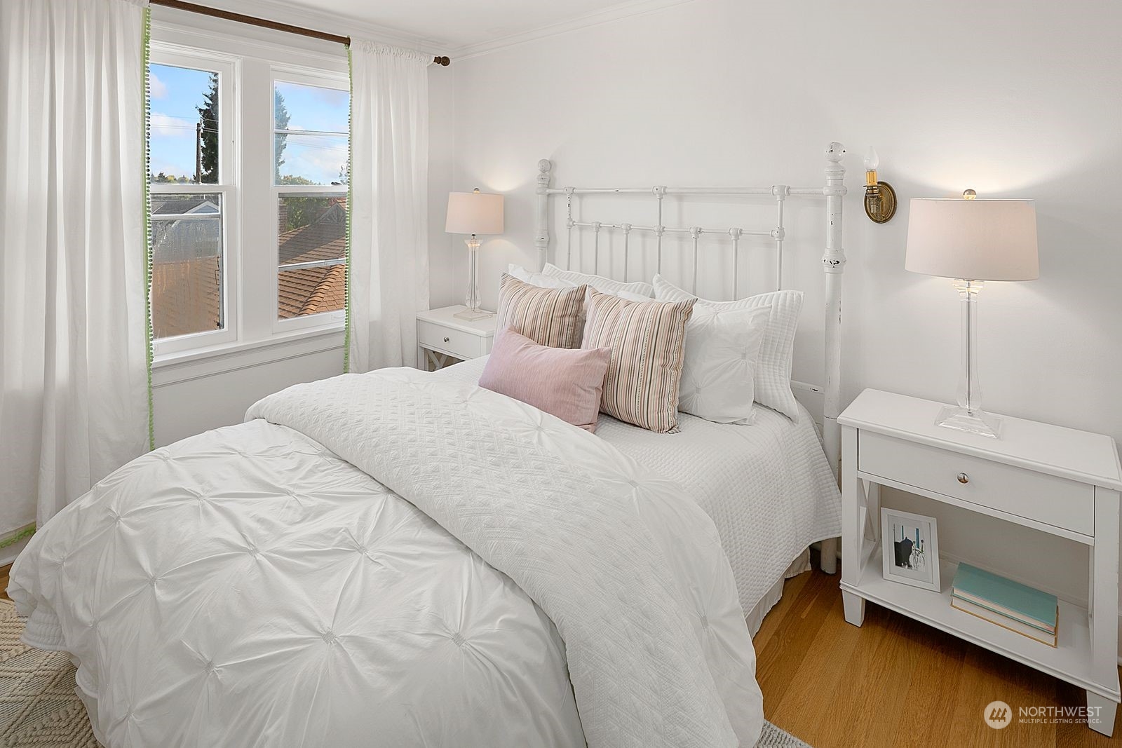 1908 Northeast Naomi Place Seattle, WA 98115 - Photo 20 of 30 a bedroom with a bed and a window