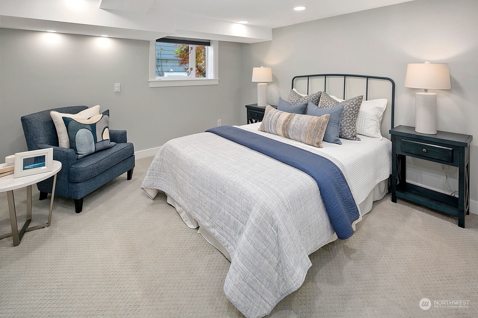 1908 Northeast Naomi Place Seattle, WA 98115 - Photo 25 of 30 a bedroom with bed and a night stand